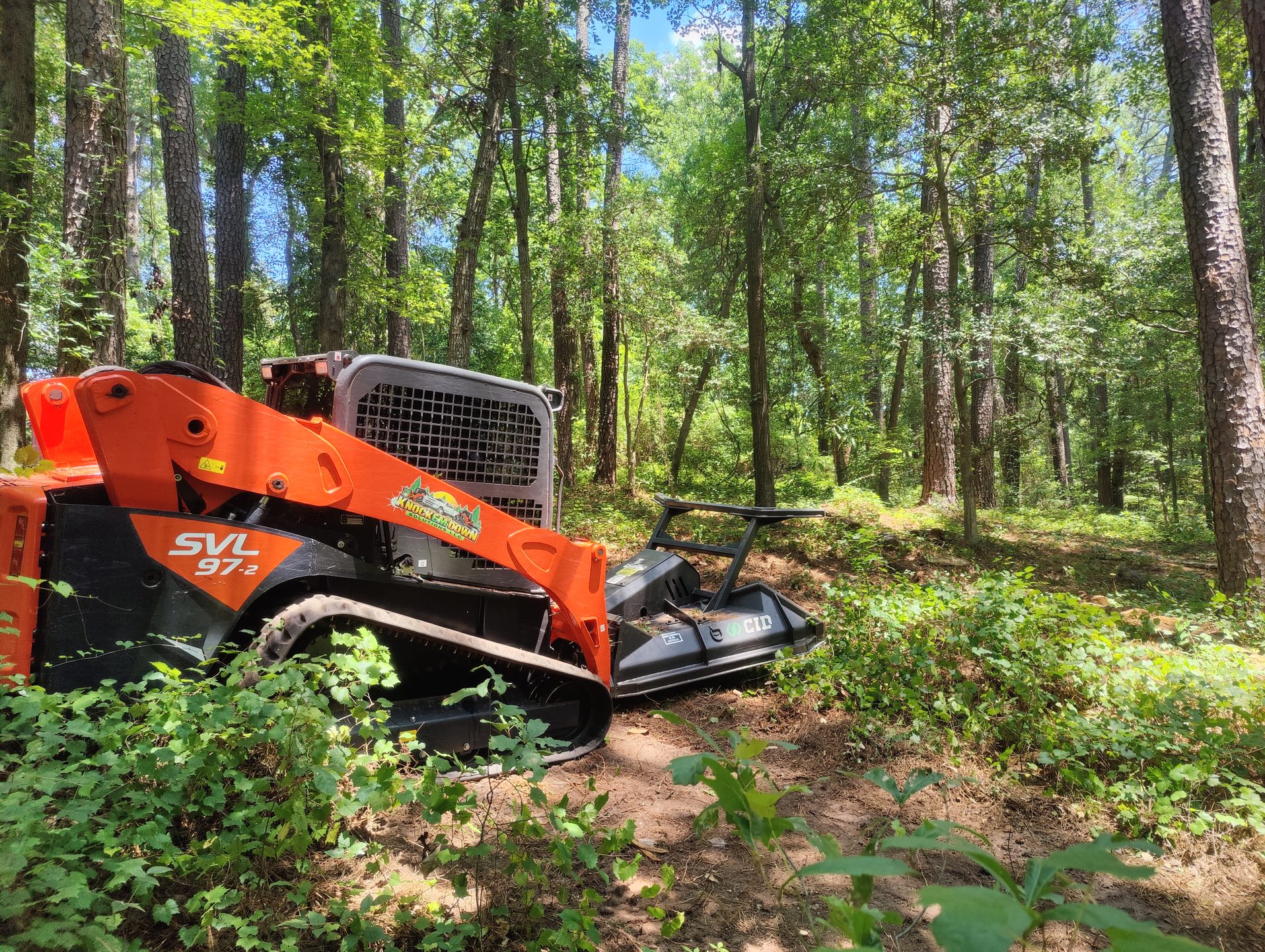 ClearThisLand forestry mulcher on a job site near Fayetteville NC